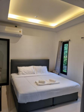 Nua tone riverside resort room1